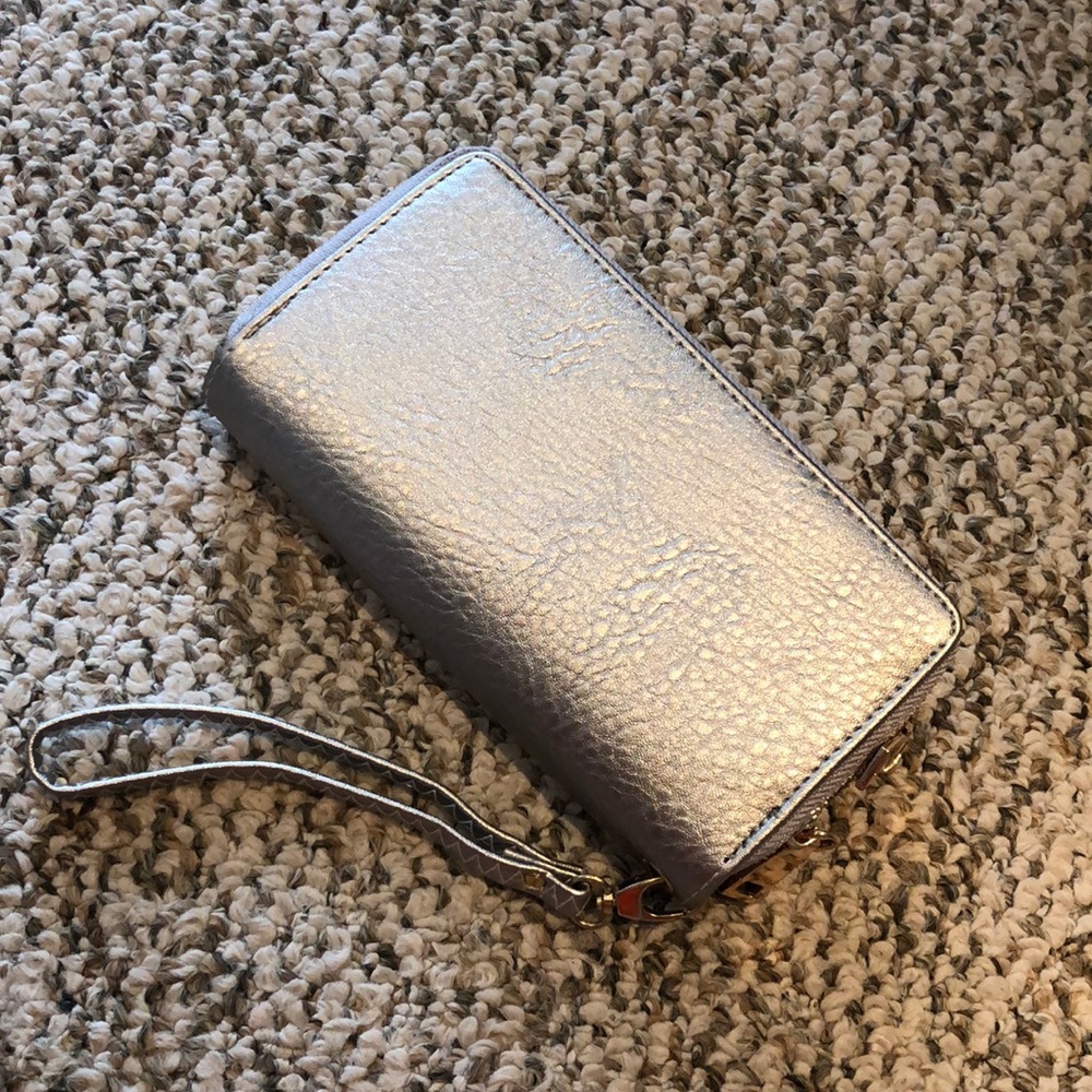 Silver wristlet.
